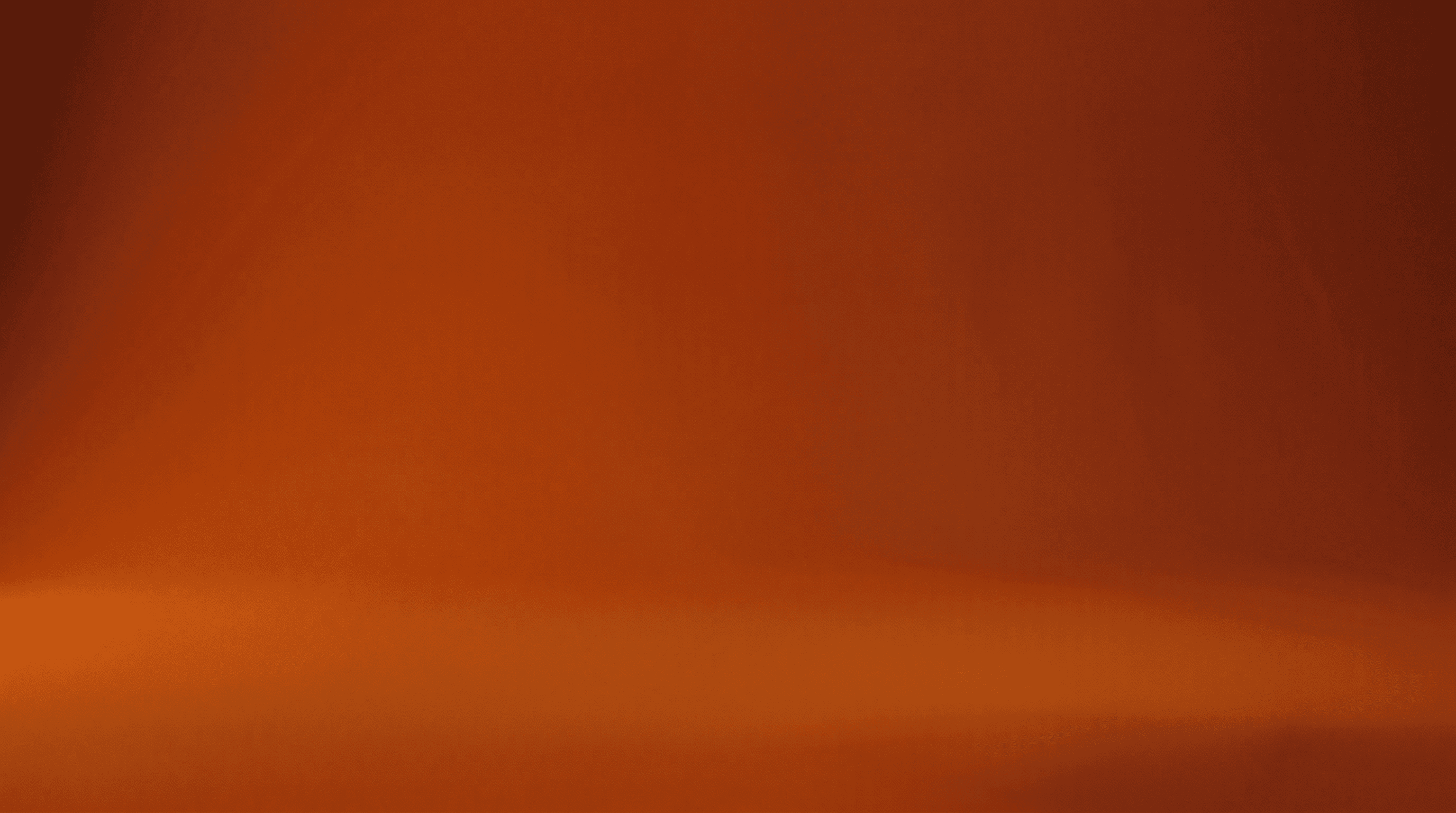 A dental implant against a warm amber backdrop